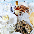 Fisk og skaldyr med citronolie, hvidvinseddike og kryddersalt fra Oliviers & Co